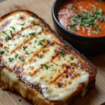 Grilled cheese sandwich on cutting board